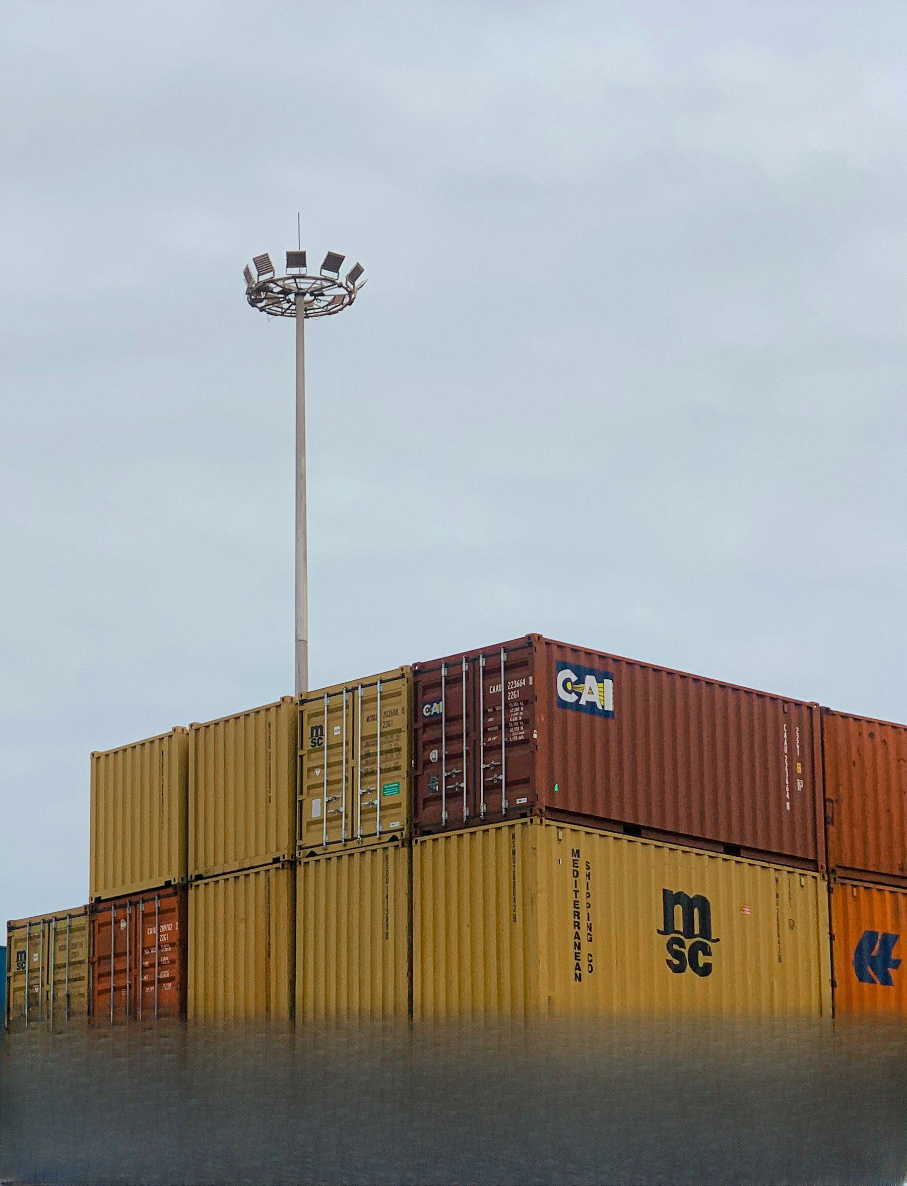 Containers stacked in a cargo yard