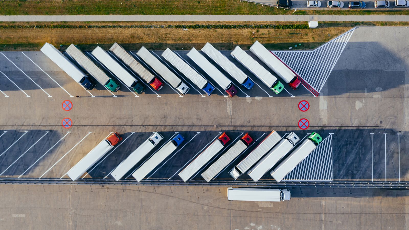 Road freight trucks travelling on a major route
